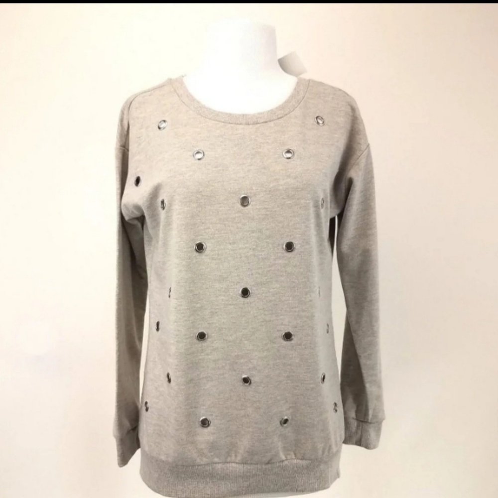 Grommet, metal accents sweater